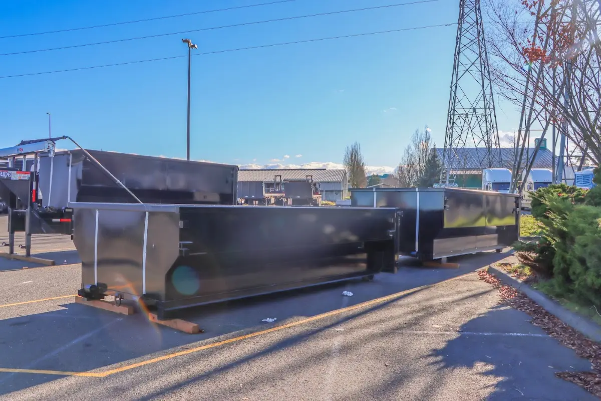 Roll-off dumpster ready for waste disposal at job site for Demolition Dumpster Rental in San Fernando
